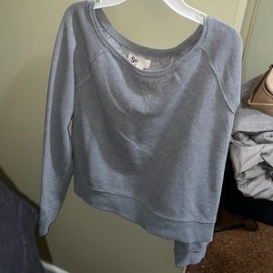 Grey sweater with Lacey design on back